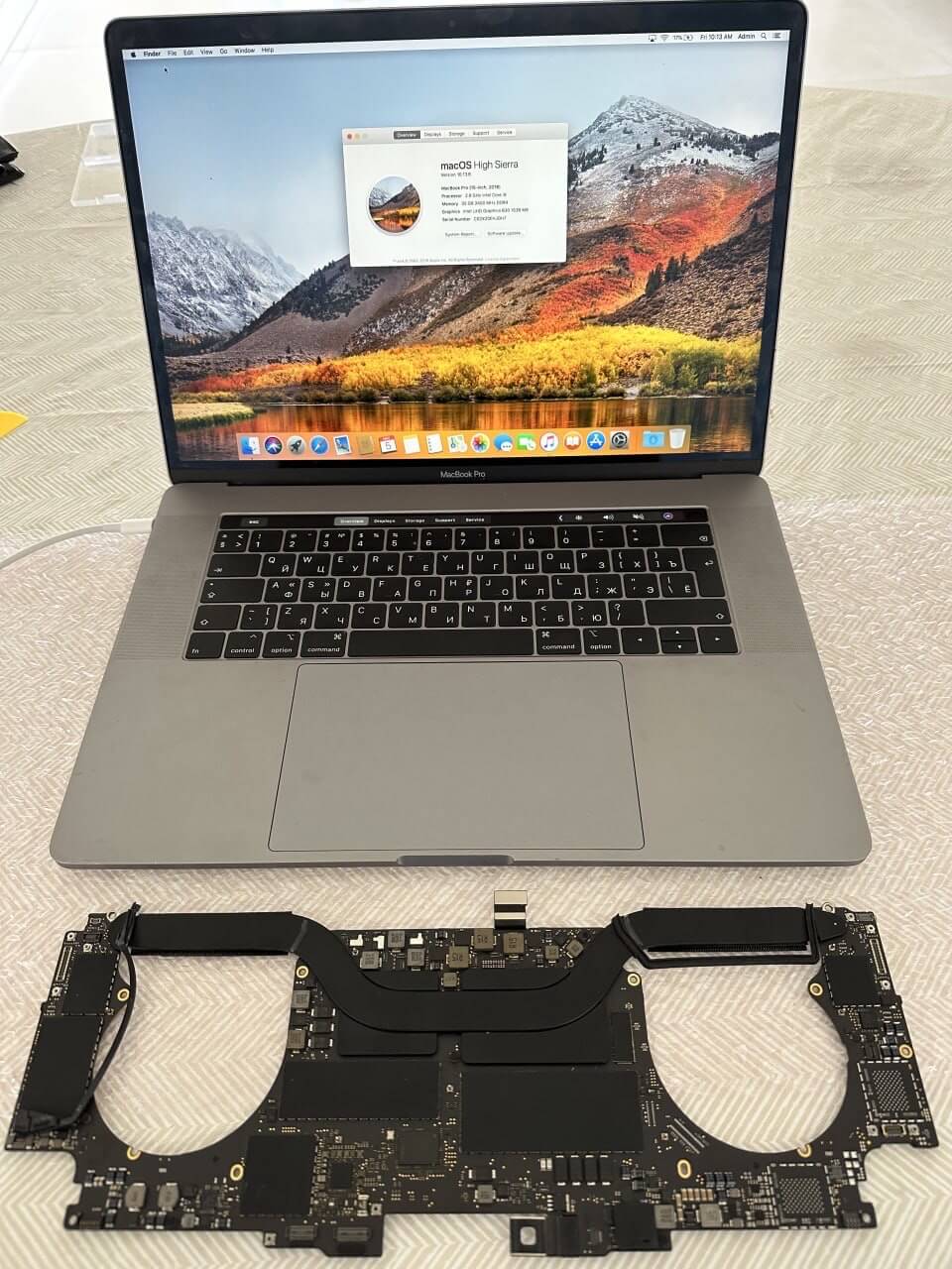 MacBook working normally again after motherboard replacement for a charging issue.